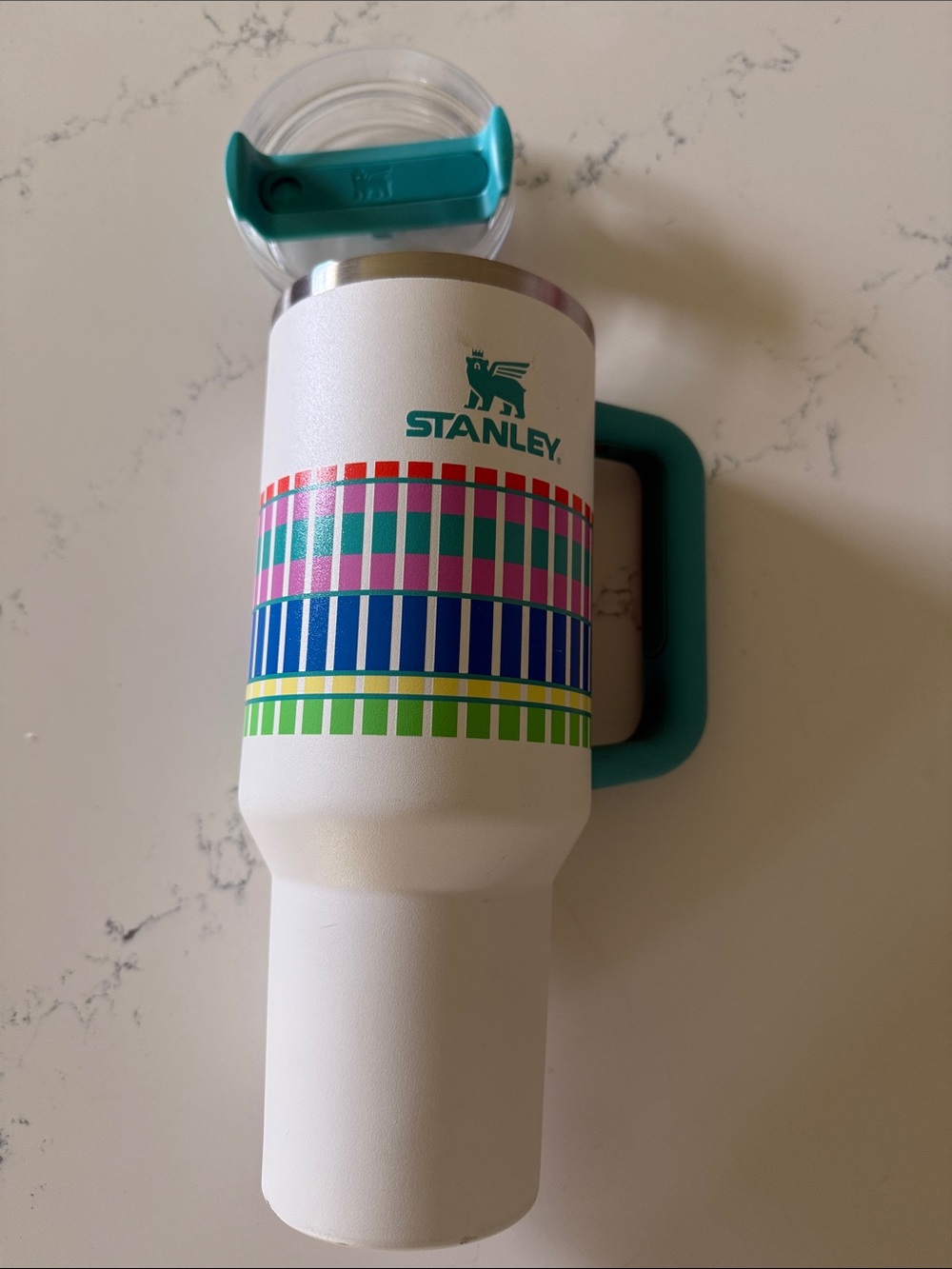 Stanley White Tumbler with Teal Handle and Multicolor Stripe Pattern